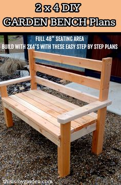 a wooden bench sitting on top of gravel