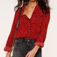 Burgundy Red Polka Dot Pajama-Style Blouse/ Button Down Made With Lightweight Fabric And Lined With Black Piping, The Benny Top Is Comfortable And Chic. Button-Down Placket, Front Chest Pocket Detail. 24" Length Front Button Closure Notched Collar Long Sleeves Buttoned Sleeves And Curved Hem Hand Wash Cold. Fiber Content: 100% Polyester Red V-neck Blouse With Buttons, Red Long Sleeve Blouse With Buttons, Fall Polka Dot Pattern Blouse With Button Closure, Fall Polka Dot Blouse With Button Closure, Polka Dot Blouse With Button Closure For Fall, Red V-neck Blouse With Button Closure, Red Long Sleeve Blouse With Button Closure, Polka Dot Button-up Blouse For Fall, Polka Dot Long Sleeve Blouse With Button Closure