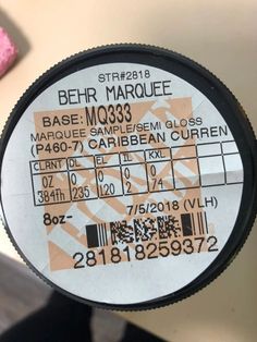 a close up view of the back of a label on a machine with numbers and symbols