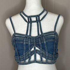 Club Exx This Super-Sexy Stretchy Denim Cropped Bustier Top Has Strappy Caged Cutouts All Over, Adjustable Shoulder Straps, And A Back Zip Closure. Materials: 70% Cotton 26% Polyester 2% Viscose 2% Spandex Care: Hand Wash Cold Denim Bustier Top, Denim Bustier, Stage Outfit, Velvet Crop Top, Backless Crop Top, Thrift Flip, Ruffle Crop Top, Strapless Corset, Underbust Corset