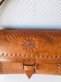 Vintage Tooled Leather Bag, Handmade Tooled Leather Purse, Boho Hippie Thick Brown Leather Purse, Vintage Handbag, Bohemian Hippie Bag 4. It has one compartment. In good vintage condition with some small signs of age and use. Some abrasion can be found at the edges. It has short ear, can be used only as handbag. Made of thick brown genuine leather. Parameters: Size: ~ 25 x 18 cm Depth: ~ 9 cm Ear: ~ 50 cm long Weight: 491 gramm Please contact me if you are interested in combining an order (which Bohemian Brown Satchel As A Gift, Bohemian Brown Satchel For Gift, Bohemian Brown Satchel As Gift, Leather Bag Handmade, Brown Leather Purse, Tooled Leather Bag, Tooled Leather Purse, Hippie Bags, Leather Frames