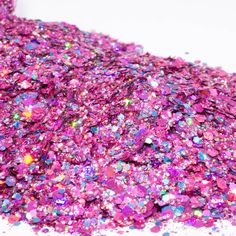 pink and purple glitter on white background