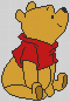 a cross stitch winnie the pooh bear with a red scarf on it's neck