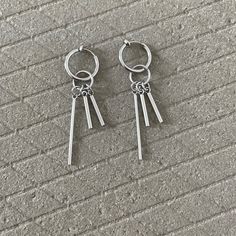 Get ready for some up-to-date versatile on-trend geometric earrings without ear piercing!! They are super comfortable without pressure on the earlobe, and you can't tell they are clip on earrings as well ;D Hope you love it! ▪️▪️▪️PRODUCTUnisex Multi Vertical Bar Clip On Hoops (Detachable Charms )316L surgical stainless steel Never Fade and HypoallergenicHeight: 5.7cmOne Pair of Earrings ( 2pc )Care instructions: avoid contact with liquids (water, perfume, beauty products) wipe dry with a soft c Minimalist Metal Clip-on Earrings For Gift, Minimalist Metal Clip-on Jewelry, Trendy Metal Drop Cartilage Earrings, Trendy Nickel-free Metal Clip-on Earrings, Minimalist Silver Drop Clip-on Earrings, Silver Clip-on Metal Cartilage Earrings, Trendy Hypoallergenic Metal Clip-on Earrings, Minimalist Dangle Cartilage Earrings, Minimalist Metal Cartilage Earrings For Everyday