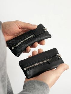 This leather key holder wallet is stitched using high-quality thread that ensures lasting use. It also features silver grommets and key holders, which are sturdy enough for long time use. This leather key pouch/wallet operates with zipper closure to secure your keys. It can hold your keys and a car key. At the same time, its interior is made of leather, which can protect your keys well. Help you solve the trouble of losing your key. If you are looking for a long-lasting solution to jingling keys Key Holder Wallet, Leather Key Holder, Key Holders, Car Key Case, Key Pouch, Key Hooks, Leather Key, Key Case, Chest Bag