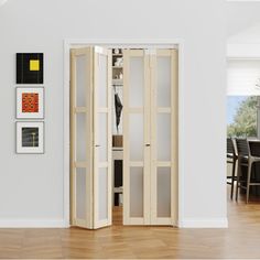 a room with white walls and wooden floors