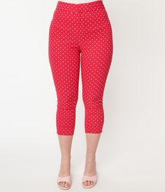 The 1960s style Smarty Pants are crafted in a marvelous hot pink pin dot stretch blend that hugs your curves for retro wonder while the fabulous high waist is nipped in with a front zipper, two hook bars, and button. The capri length drops to a cuffed hem with adorable light pink daisy shaped back pockets!Available in sizes XS-4X while supplies last. Fitted Pinup Bottoms For Summer, Summer Stretch Polka Dot Bottoms, Pink Stretch Vintage Bottoms, Retro Pink Short Bottoms, Retro Stretch Bottoms Short Length, Retro Pink Shorts, Retro Stretch Bottoms In Short Length, Retro Polka Dot Bottoms For Summer, Retro Polka Dot Summer Bottoms