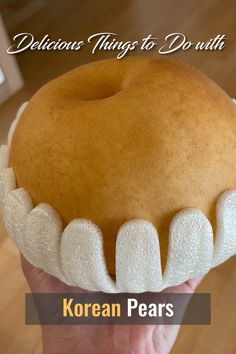 a person holding a donut with fake teeth on it's face and the words delicious things to do with korean pears