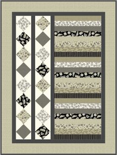 a quilted wall hanging with black and white designs on it's borders