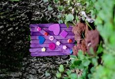 a purple bench with hearts and buttons on it