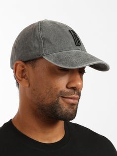 This baseball cap blends modern design and vintage-washed cotton for a soft, flexible fit. The adjustable strap is finished with a metal buckle and mini logo label embellishment. Above the curved brim sits an embroidered 'B," an elevated touch on a lived-in classic. #B0911202-34314 Fabric: 100% Cotton Urban Baseball Cap With Logo Patch And Curved Visor, Adjustable Washed Dad Hat With Curved Visor, Washed Snapback Baseball Cap, Washed Baseball Cap With Curved Brim For Streetwear, Washed Curved Brim Baseball Cap For Streetwear, Washed Snapback Baseball Cap For Streetwear, Streetwear Washed Snapback Baseball Cap, Washed Dad Hat With Curved Brim For Streetwear, Black Washed Cotton Baseball Cap