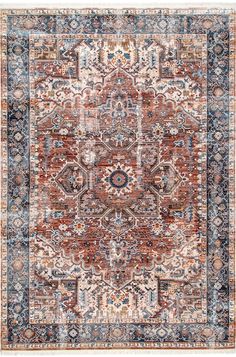 an orange and blue rug with many different designs on it, including the center medallion