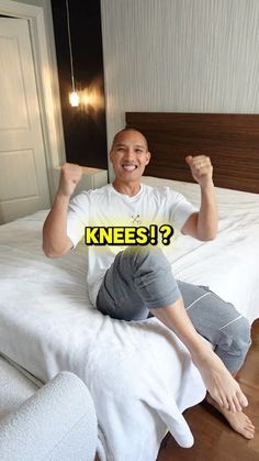 a man sitting on top of a bed with the words knees written in front of him