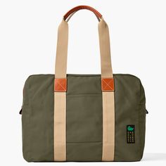 Travel in Style  With this travel-ready look, crafted from 100% Egyptian cotton canvas woven in Italy, you'll be able to pack for days at a time, so get ready to see the world in style. Casual Khaki Canvas Travel Bag, Khaki Canvas Travel Bag, Canvas Weekender Bag With Pockets, Canvas Weekender Bag With Pockets For Weekend Trips, Cotton Travel Bag With Pockets, Casual Weekender Bag With Waxed Finish For Travel, Casual Canvas Travel Bag For Overnight Trips, Casual Canvas Weekender Bag For Weekend Trips, Casual Waxed Finish Weekender Bag For Travel