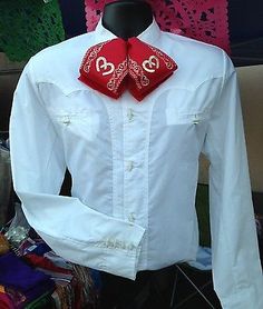 a white shirt with red hearts on the collar