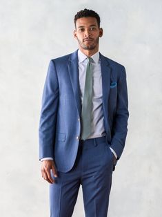 Blue Suits With Welt Pockets For Spring, Spring Blue Wool Blazer, Blue Slim Fit Single Breasted Sport Coat, Blue Single Breasted Slim Fit Sport Coat, Blue Single-breasted Slim Fit Sport Coat, Fitted Blue Wool Sport Coat, Blue Fitted Wool Sport Coat, Blue Suits With Notch Lapel And Hidden Button Closure, Blue Long Sleeve Suits With Hidden Button Closure