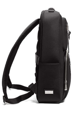 the back view of a black backpack with straps and zippers on it, against a white background