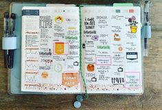 an open planner with lots of stickers on it