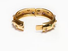 Tiffany Co. Paloma Picasso 18 Karat Gold Bangle-Bracelet Yellow Gold Bangle Bracelet With Gemstone Accents, Gold Bangle With Gemstone Accents, Jeweled Yellow Gold Bangle Bracelet, Gemstone Bangle Bracelets, Paloma Picasso, Gemstone Bangle, Bracelet Vintage, Green Stone, Paloma