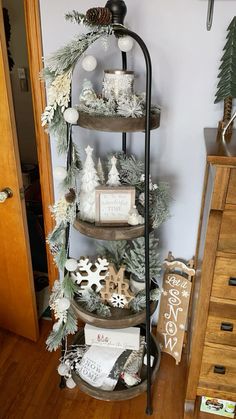 a corner shelf with christmas decorations on it