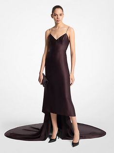 This slip dress delivers indisputable glamour, making it the perfect choice for black-tie events. Cut from swathes of satin charmeuse, it features a fitted bodice and skirt that pool into a fishtail train. Accessorize it with black heels and a clutch. Made in Italy. Slip Gown, Black Tie Event, Michael Kors Collection, Fitted Bodice, Black Tie, Black Heels, Jumpsuit Dress, Bodice, Slip Dress