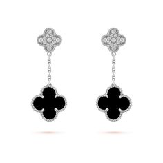 Add a touch of elegance and sophistication to any outfit with our Clover Diamond and Onyx Earrings. Made with stunning clover-shaped diamonds and onyx stones, these earrings are the perfect accessory for any special occasion. Elevate your style and make a statement with these exquisite earrings. ADDITIONAL INFORMATION Color: Silver Stone: Cubic zirconia, onyx Ref. VCARO9II00 Material:- 925 Sterling Silver - 18k Gold Plated- 18k Real Gold ( contact us via instagram) Our replica products are commi Luxury Black Gemstone Earrings, Luxury Black Diamond Earrings, Luxury Black Diamond Earrings For Evening, Luxury Black Diamond Earrings For Formal Occasions, Luxury Sterling Silver Flower Shape Diamond Earrings, Luxury Silver Earrings With Black Diamonds, Luxury Gemstone Flower-shaped Earrings, Luxury Black Sterling Silver Earrings, Elegant Black Diamond Earrings