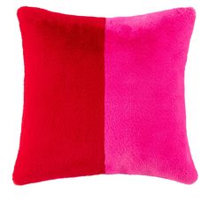 a red and pink pillow on a white background