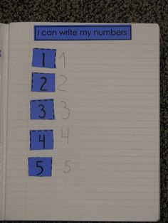 an open notebook with blue numbers on it and the words i can write my numbers