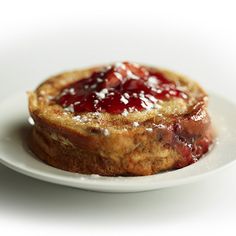 a piece of bread with strawberry jam on it