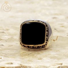 "It is a 925 Sterling Silver Mens Ring which has polished smooth mould and a curved Onyx Gemtone. There is Arabic protection Vaw letters engraved on the frame of stone. One of high quality handmade silver ring from our designs. All my designs are coming from a passion. Has 1 year guaranty for the production mistakes. Stone : Onyx Gemstone Material: Sterling Silver 925k and Bronze (yellow parts) Plated: Rodium Plated Weight: 17.00gr Please make sure you have correct measurements from the size car Black Engraved Ring With Polished Finish For Formal Occasions, Formal Black Engraved Ring With Polished Finish, Formal Onyx Rings With Polished Finish, Luxury Black Engraved Ring For Formal Occasions, Classic White Gold Onyx Rings, Luxury Silver Rings With Classic Design, Luxury Black Engraved Ring With Polished Finish, Elegant Sterling Silver Signet Ring With Polished Edges, Formal Black Engraved Ring