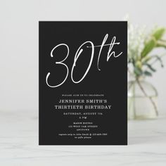 a black and white 30th birthday party card