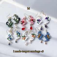 the earrings are all different colors and designs