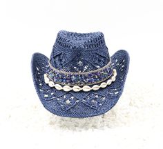 Deep Blue Sea - Natural Navy Cowboy Hat - Stones of Dark Blue & Rhinestones with Shell Band - Beach Ocean Tones - Sturdy Box This is a comfortable cowboy hat to wear to the beach, concerts or rodeo. It's always ready to keep you shaded. Material: Durable natural woven straw Hat Size: US Hat Size 7 1/4 - 7 1/2 Hat Crown: 12cm Hat Brim: 8cm Color: Black Size fits up to 23.5 inches 58cm-60cm Free Hat Retainer with each Hat Order Blue Western Hat For Vacation, Adjustable Blue Beaded Hat, Adjustable Beaded Blue Hat, Blue Bohemian Beaded Hat, Bohemian Blue Beaded Hat, Adjustable Blue Hat With Rhinestones, Blue Adjustable Hat With Rhinestones, Blue Rhinestone Hat For Summer, Blue Summer Hat With Rhinestones