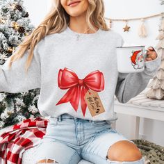 Share the most precious gift this Christmas with this heartwarming "Best Gift Ever" pregnancy announcement sweatshirt! Featuring a festive bow design and the sweetest message, this cozy sweater is the perfect way to reveal your exciting news to family and friends during the holiday season.     This is NOT a maternity sweatshirt. We recommend ordering up to accommodate a growing baby bump. :)     Soft, comfortable fabric perfect for expecting moms, providing a gentle and cozy fit during pregnancy.     Heartwarming Christmas design with the touching phrase "Best Gift Ever"     Direct to garment print     Multiple sizes available to accommodate growing bumps     Makes a memorable and touching pregnancy reveal Surprise your loved ones with this joyful announcement and create lasting memories t Christmas Pregnancy Announcement Gift, Pregnancy Christmas Sweater, Christmas Pregnancy Shirts, Pregnant Christmas Shirts Vinyl, Pregnant Christmas Shirt, Christmas Shirts For Pregnant Women, Christmas Pregnancy Reveal, Christmas Maternity Shirt, Christmas Baby Announcement