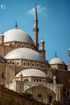 an old building with two domes on top