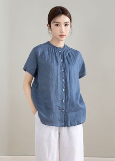 "Our blue linen shirt, loose, comfortable and versatile. It is practical enough to tuck into your favorite shirt, our blouse can also pair with skinny jeans, yes, it is a good choice for women tops.This shirt can be worn on both sides. Why Good selection with linen shirt? The main benefit of wearing linen clothes in hot weather is the coolness they provide. Linen is highly absorbent and a good conductor of heat. Your linen garment feels cool to the touch and linen fabric will quickly remove pers Relaxed Fit Ramie Blouse, Solid Ramie Tops For Spring, Casual Ramie Top For Spring, Casual Ramie Tops For Daywear, Spring Relaxed Fit Ramie Shirt, Spring Relax Fit Ramie Shirt, Linen Workwear Top, Solid Linen Tops For Work, Solid Linen Top For Work