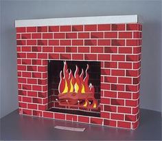 a red brick fire place with flames coming out of the top and bottom part,