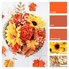 an arrangement of autumn flowers and leaves on a table