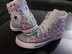 Customized bling high top converse chuck Taylor's. Made to order. Good for any occasion.  Wedding, anniversary, birthday, finishing touches for an outfit. Need a certain color let's discuss it High top Converse- Blue, Pink and White with clear Rhinestone -Will accomodate different color palettes, just message me- Please be mindful when ordering that Chuck Taylor Converse are a unisex sneaker and run a half size larger for ladies. Bedazzled Chucks, Bedazzled Converse Diy, Bedazzled Converse, Glittery Shoes, Shoes Decoration, Diy Bling, Bling Converse, Chuck Taylor Converse, High Top Converse