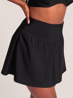 Your sunny adventure sidekick, Shapermint Essentials High Waisted Full Coverage Swim Skirt gives you the full-coverage confidence and flattering fit you deserve. Take this versatile flounce skirt style from brunch to the beach. Its wide and high-profile waistband smooths your midsection, and its built-in bikini bottom delivers maximum comfort. Pair this skirt with the Shapermint Essentials Full Coverage Halter Bikini Top and your outfit is complete! Wide Waist Band for Smoothing No Muffin Top Fl Flowy Skirted Swim Skirt With Built-in Shorts, Flowy Tiered Skirt With Built-in Shorts, Flowy Swim Skirt With Built-in Shorts, Relaxed Fit Solid Flared Skort, Flared Mini Skirt With Wide Waistband, Solid Color Gathered Mini Skirt, Solid Flowy Skort, Stretch Solid Pleated Swim Skirt, Stretch Solid Color Pleated Swim Skirt