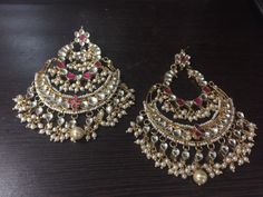 Indian Kundan Jewelry Designer Chandbali Earrings Ethnic wear Gold Tone Chand Bali for Indian Women and perfect match for all Bridal Outfits. *It's Handmade Indian Ethnic Kundan Chandbali Earrings with Pearl drop. *It's made from Silver n Copper with White Kundan Stones Settings with 22k gold Plating as shown in picture. *It gives Pure Ethnic Look with Antique Touch and it is 3.8 inch long and 2.8 inch wide. It is heavy fashion statement chand bali specially design for unique look. *Our all jewe Traditional White Hand Set Chandbalis, White Kundan Hand Set Danglers, White Hand Set Kundan Danglers, White Kundan Danglers With Hand Set, White Bollywood Style Hand Set Earrings, Traditional Handmade White Danglers, Traditional White Handmade Danglers, Handmade Traditional Kundan Chandbalis, White Handmade Chandbali Jhumkas