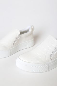 Lulus Exclusive! Your classic sneaker gets a major upgrade with the Lulus Cassay White Crocodile-Embossed Platform Slip-On Sneakers! Shiny crocodile-embossed faux leather shapes these slip-on sneakers that have a rounded toe upper and elastic gussets for fit. Pull tab at back. 1.5"" white bumper sole. Lightly cushioned insole. Rubber sole has nonskid markings. All Man Made Materials. Imported. Lulus | Cassay White Crocodile-Embossed Platform Slip-On Sneakers | Size 7.5. Platform Slip On Sneakers, Flatform Sneakers, Classic Sneakers, Slip On Sneakers, Slip On Sneaker, Style Me, Slip On, Faux Leather, Sneakers