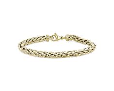 Made with 14k Italian yellow gold, this interwoven wheat chain bracelet is a lightweight piece ideal for daily wear. Classic Gold Bracelet With Wheat Chain, Classic 14k Gold Bracelet With Wheat Chain, Classic Braided Jewelry For Formal Occasions, Classic Gold Chain Bracelet With Wheat Chain, Classic Gold Wheat Chain Bracelet, Classic Formal Bracelet With Wheat Chain, Formal Yellow Gold Bracelet With Wheat Chain, Formal Yellow Gold Wheat Chain Bracelet, Elegant Everyday Braided Bracelets