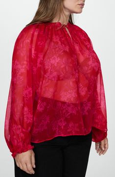 Delightful blooms brighten this charming semisheer top accented with fanciful frills. Ties at neck Long sleeves with elasticized cuffs 100% polyester Machine wash, line dry Imported Tie Neck Top, Mango Blouse, Tie Neck Tops, Red Fits, Floral Print Blouses, Printed Ties, Tie Neck, Sheer Fabrics, Printed Blouse