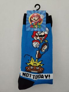 This listing includes: Super Mario Goomba Crew Socks Quantity: 2 Pairs Brand New Why buy boring socks? When you can buy these fun, unique, and comfortable socks!!! These socks have a great & funny theme. Goomba "Not today". These are a classic. Must have socks!! Check out my store for many other cool items!!! Everything is Free Shipping!!!! Upon purchase, item will be shipped within 1 - 3 days I don't sell outside the United States!!! Funny Blue Socks For Gift, Novelty Multicolor Socks For Stocking Stuffers, Multicolor Novelty Socks For Stocking Stuffer, Super Mario Goomba, Mario Goomba, Comfortable Socks, Not Today, Cool Items, Super Mario