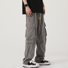 Elevate your style with these Japanese corduroy cargo pants. Crafted with precision and a luxurious feel, they feature straight legs and multiple cargo pockets for added functionality. Perfect for all your daily adventures, these pants will keep you comfortable and effortlessly stylish. Features: -85% Cotton,15% Polyester -Mid-rise waist -Multi-Pockets -Regular Fit -Japanese style