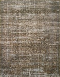 an area rug with different colors and patterns on the carpet, including brown, beige and white