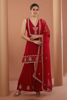 Red sleeveless kurta with zardozi, bead embroidery in geometric placement pattern. Paired with flared pant and dupatta. - Aza Fashions Red Sleeveless Georgette Sets, Red Sleeveless Sharara With Dupatta, Red Sleeveless Sharara For Festive Occasions, Traditional Sleeveless Red Sets, Traditional Red Sleeveless Sets, Red Sleeveless Sets For Diwali, Red Sleeveless Traditional Dress, Sleeveless Sharara With Dupatta, Red Sleeveless Navratri Set