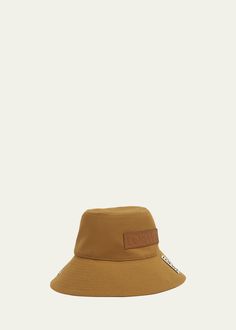 "Find LOEWE Fisherman Orange Bucket Hat on Editorialist. Loewe \"Fisherman\" bucket hat in cotton, linen, and leather Flat crown Embossed logo patch Logo tab Downturned brim Made in Italy" Orange Bucket Hat, Leather Flats, Embossed Logo, Soft White, Cotton Linen, Patch Logo, Bucket Hat, Accessories Hats, Honey