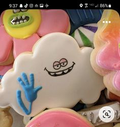 cookies decorated like cartoon characters are on display